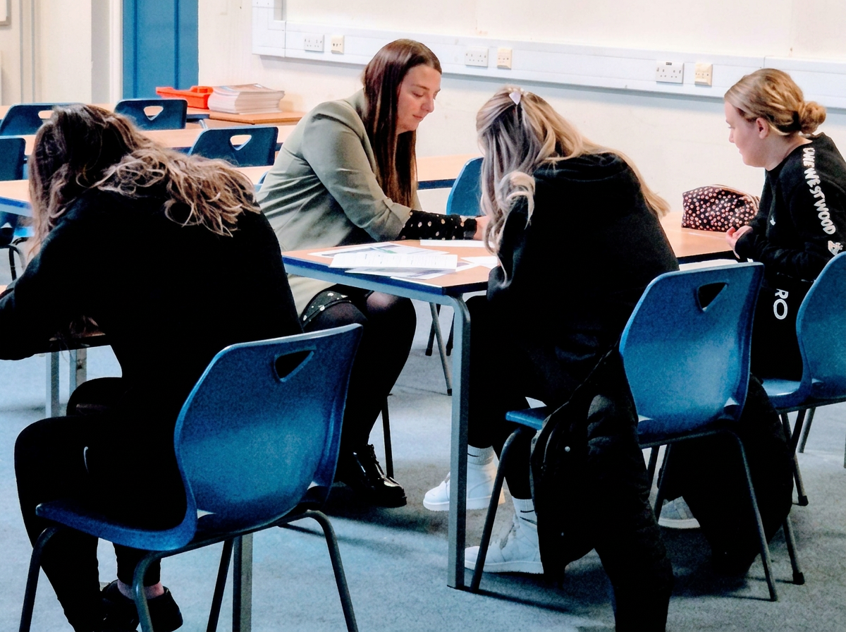 A Rose Tuition teacher working with students at Kimberley